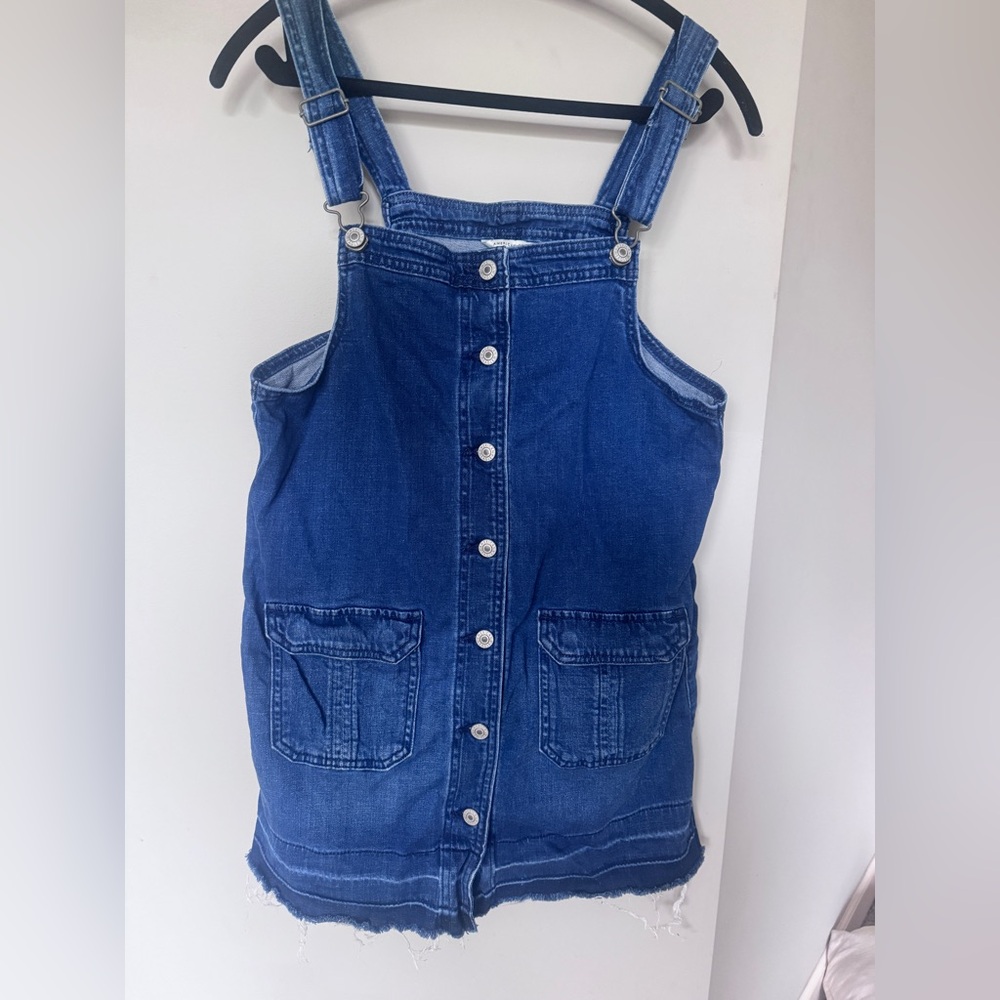 American Eagle Outfitters women's button up denim jumper with raw hem.